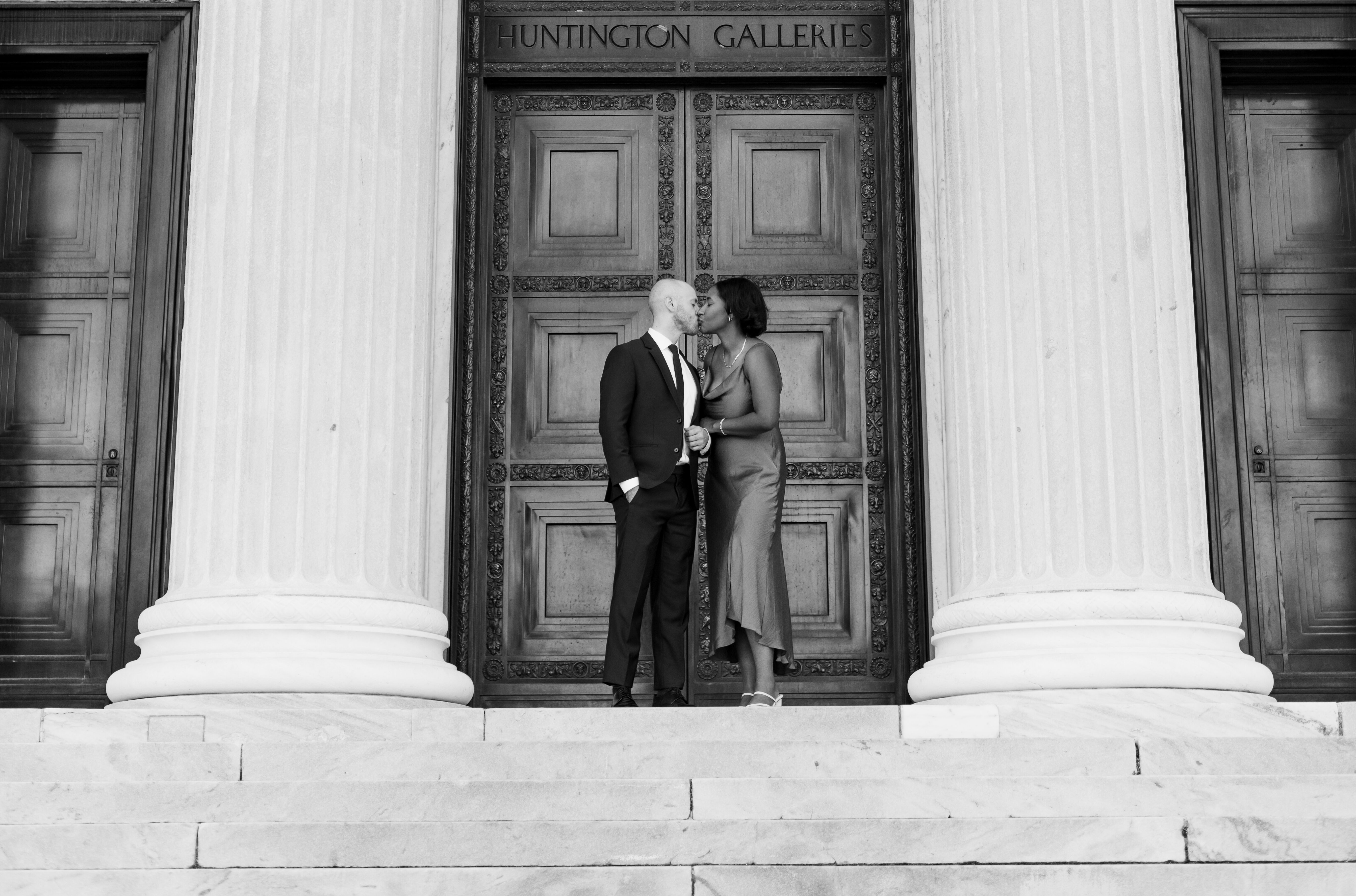 Bride and groom embrace outside of the courthouse on their wedding day. Photo taken by Cincinnati Wedding photographer Aaron Aldhizer